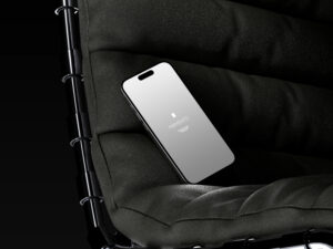 Mockup de iPhone em Poltrona Escura Grátis